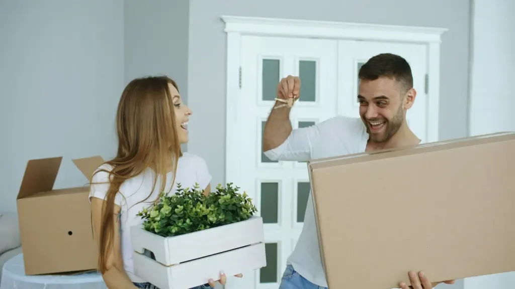 Homebuyers holding the keys to their newly inspected home